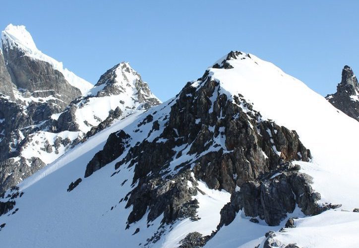 Hiking in the snowy mountains in Antarctica